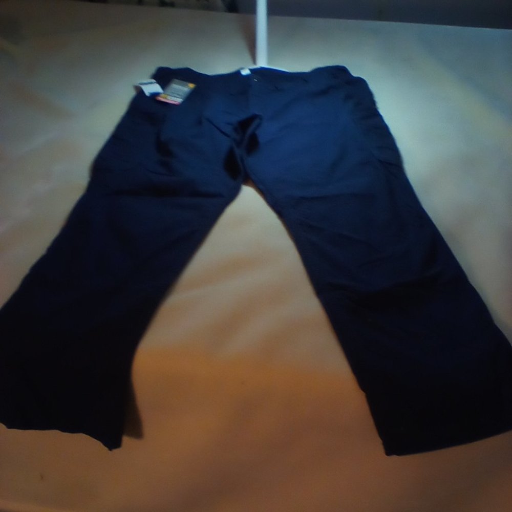 Carhartt blue,size 18W tall, rip tie material, ladies work pants, never worn.